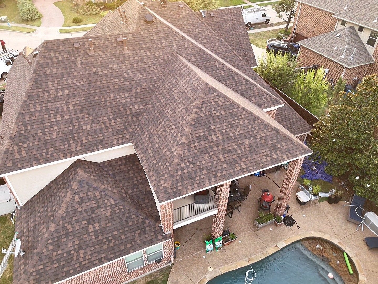 Completed roof and resort-style backyard pool on one Texas property
