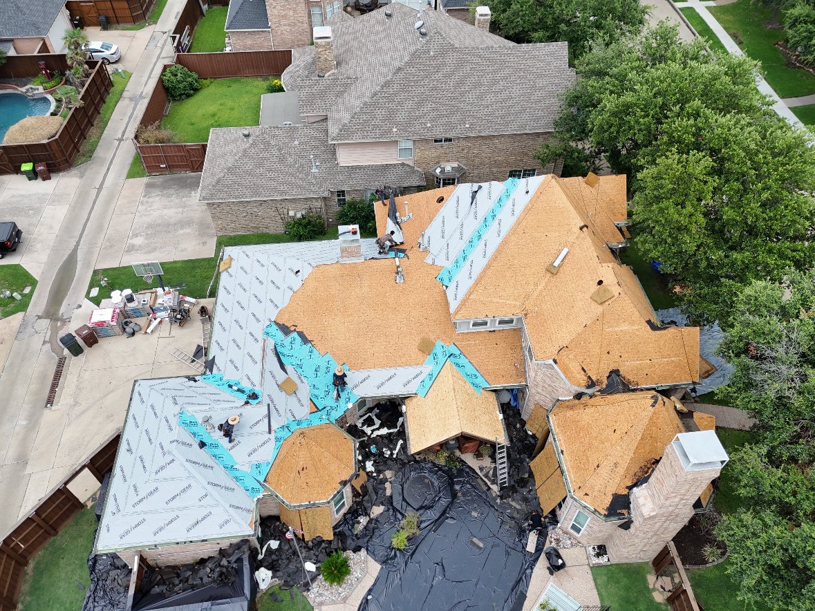 New shingle roof with solar panels on a Texas home
