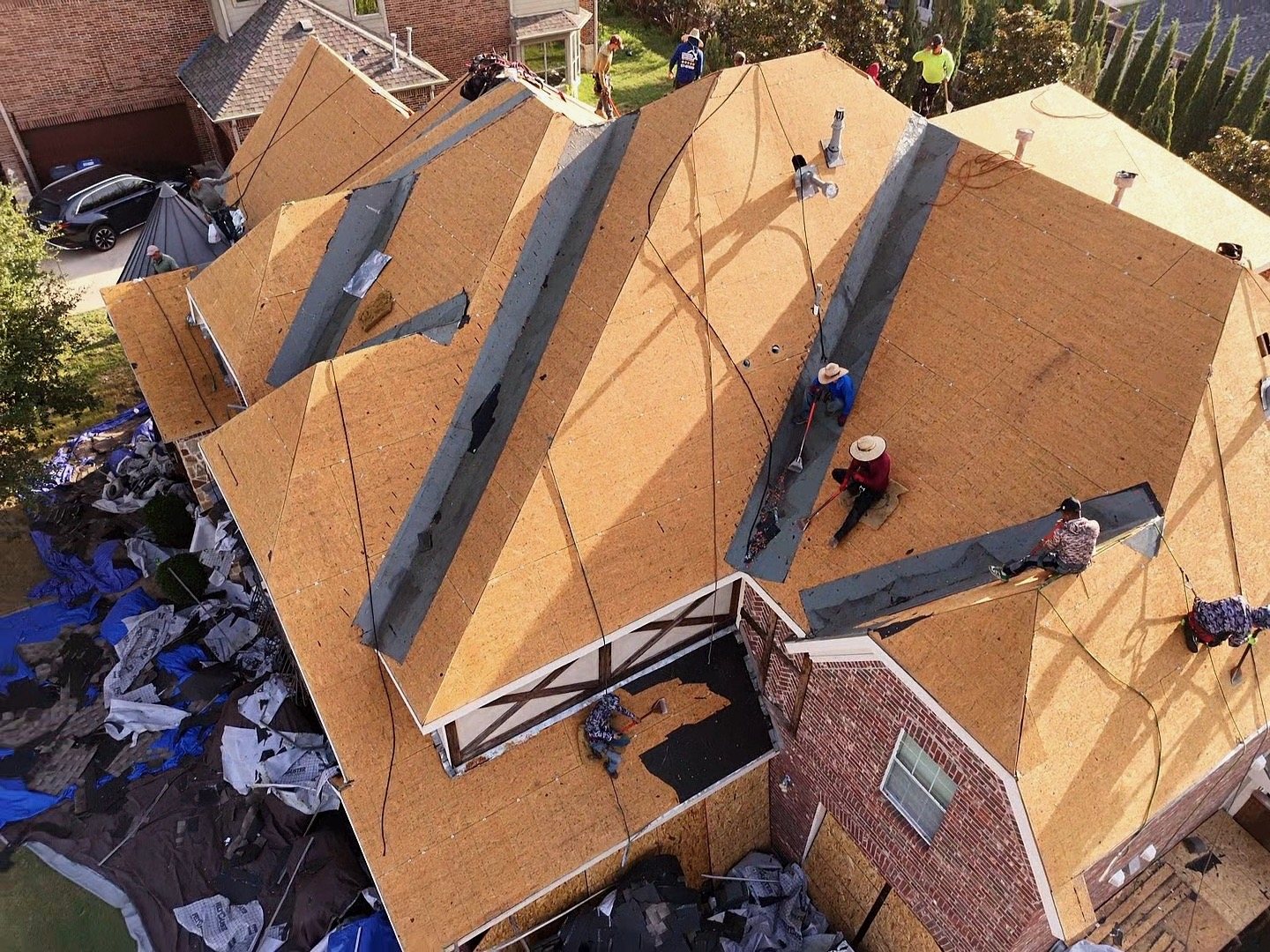 Storm rebuild — roof decking replaced and prepped for new shingles