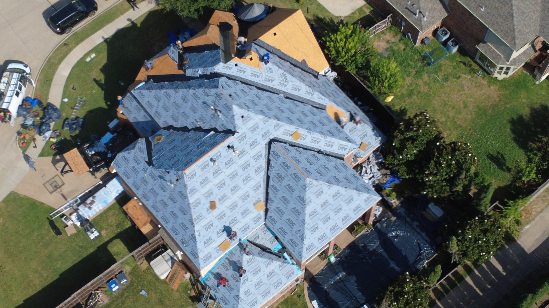 New shingle roof with solar panels on a Texas home