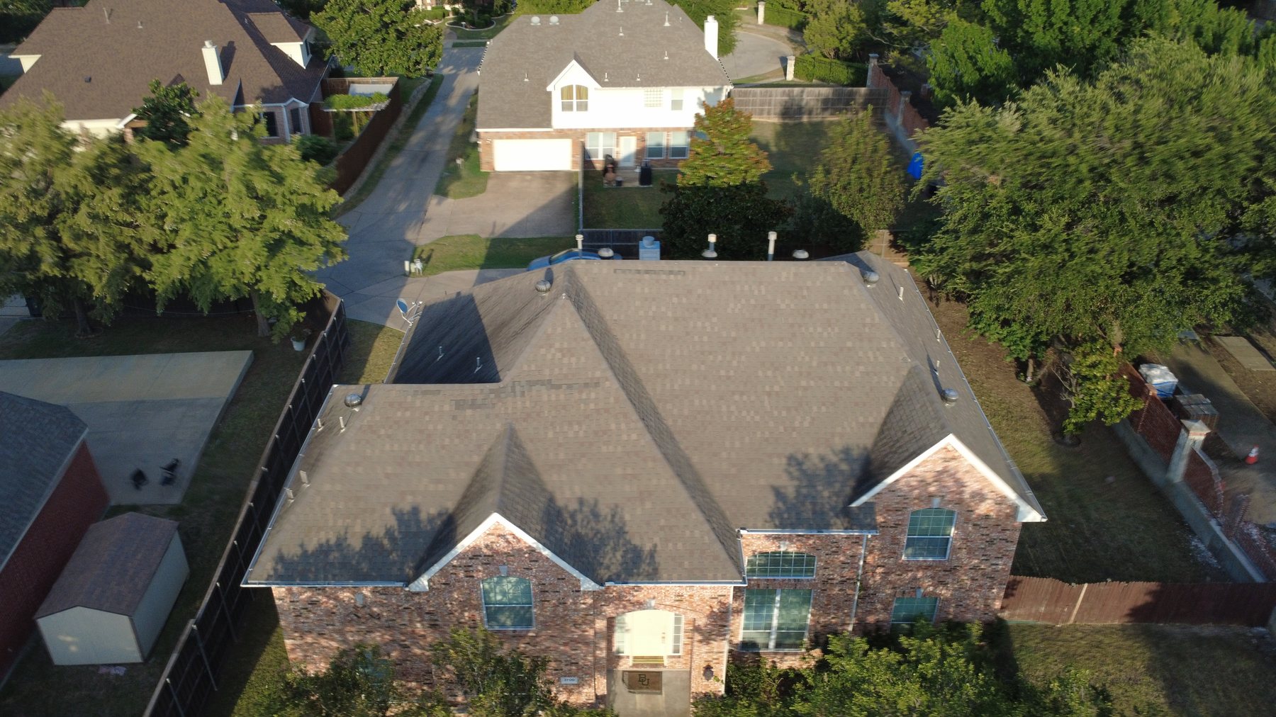 Completed new roof on a two-story Texas home