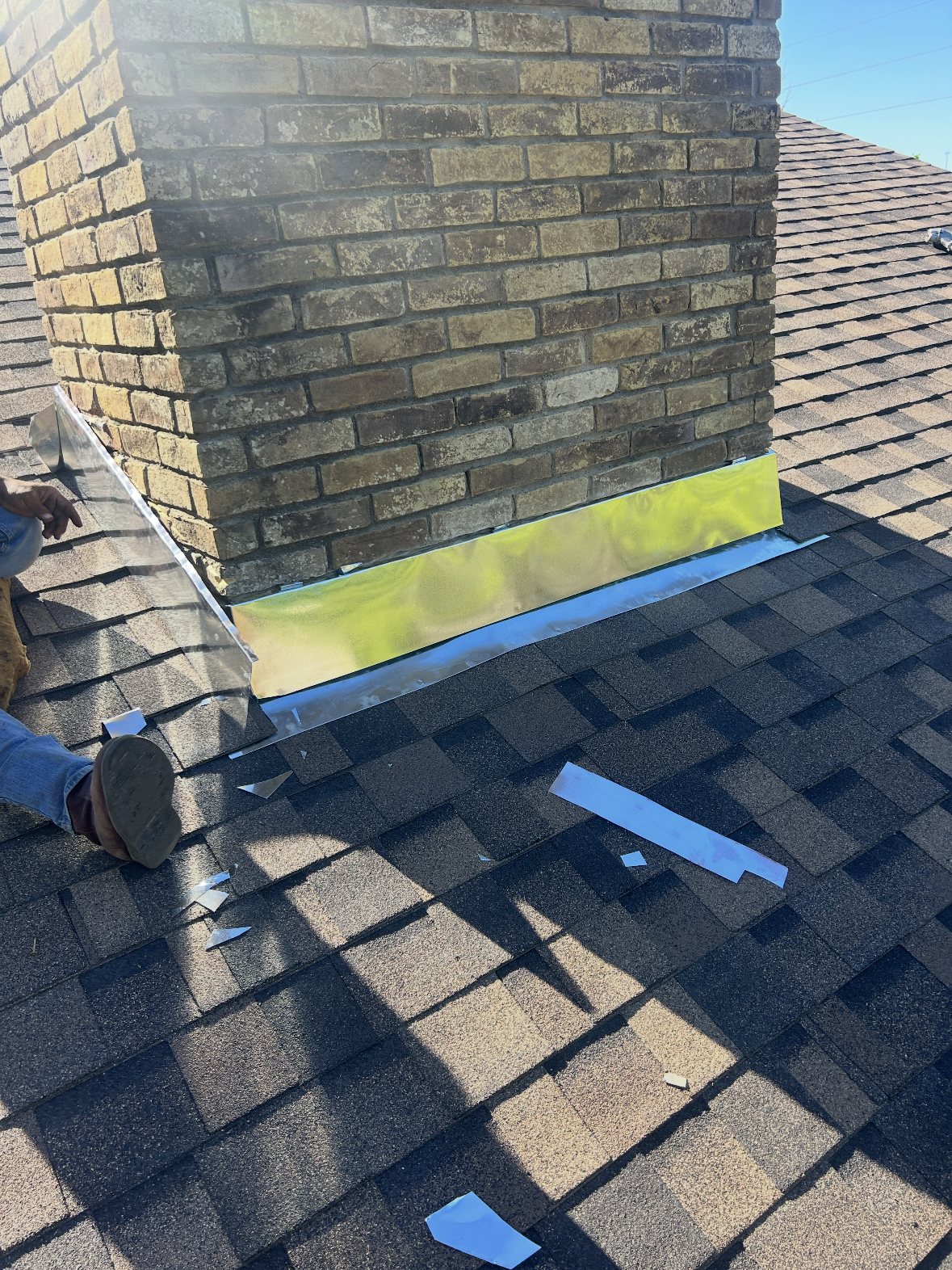 New shingle roof with solar panels on a Texas home