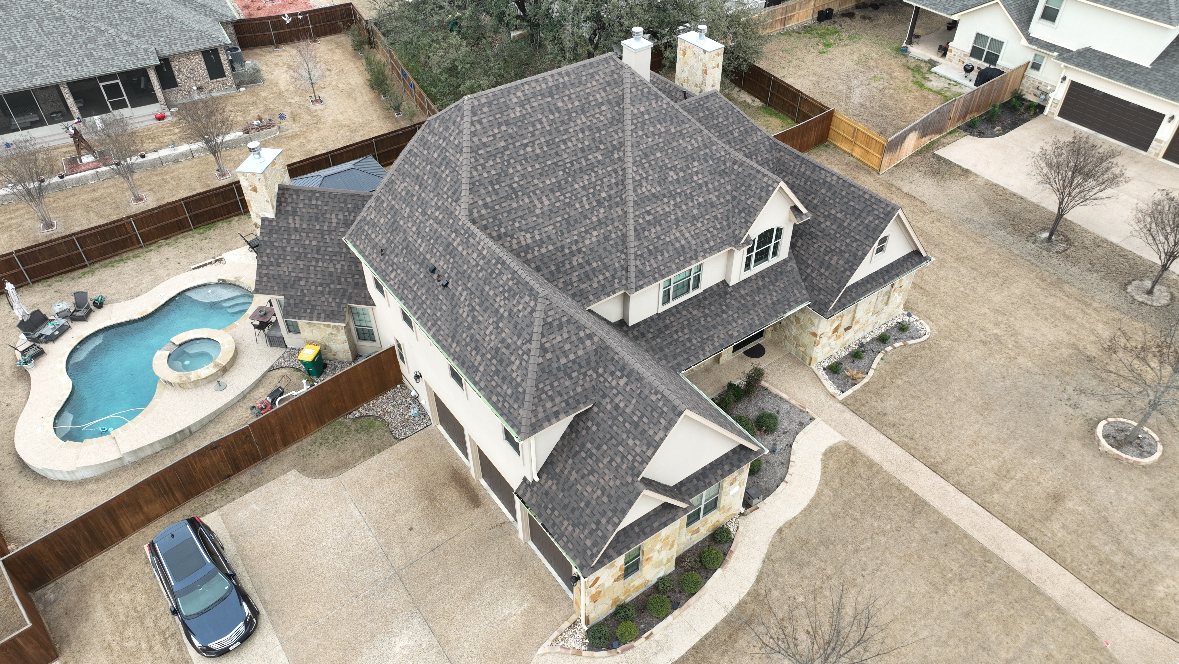 Finished roof and resort-style pool built by one team for the whole property